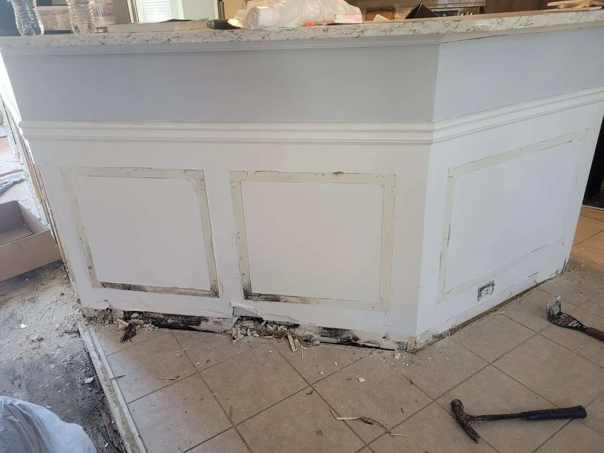 Water damage and mold on kitchen during Storm Damage Restoration in Andrews